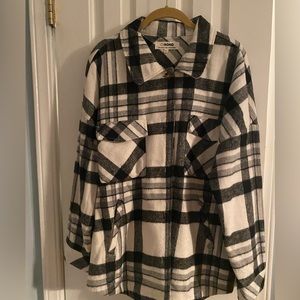 Black plaid never worn, tags were taken off.